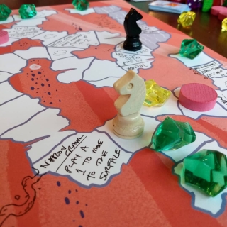 A cooperative mining game on the Cobble Cave board